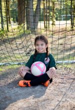 Ava Sitting With Her Ball