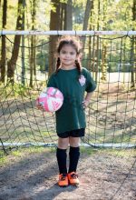 Ava Standing With Her Ball